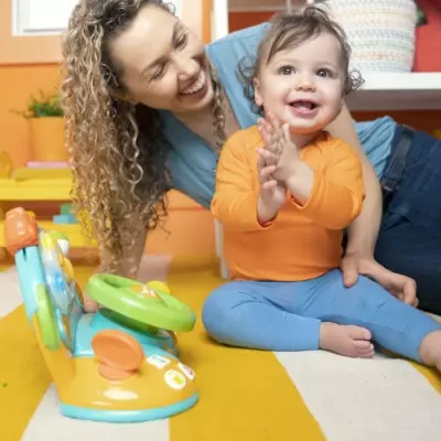 BRIGHT STARTS Volant lumineux et coloré, jeu d'éveil 6m+