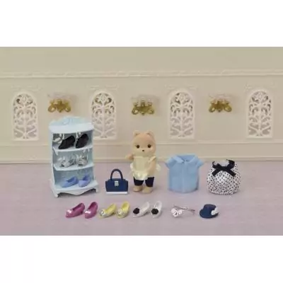 Sylvanian Families La valisette de mode et grande sœur Chien caramel